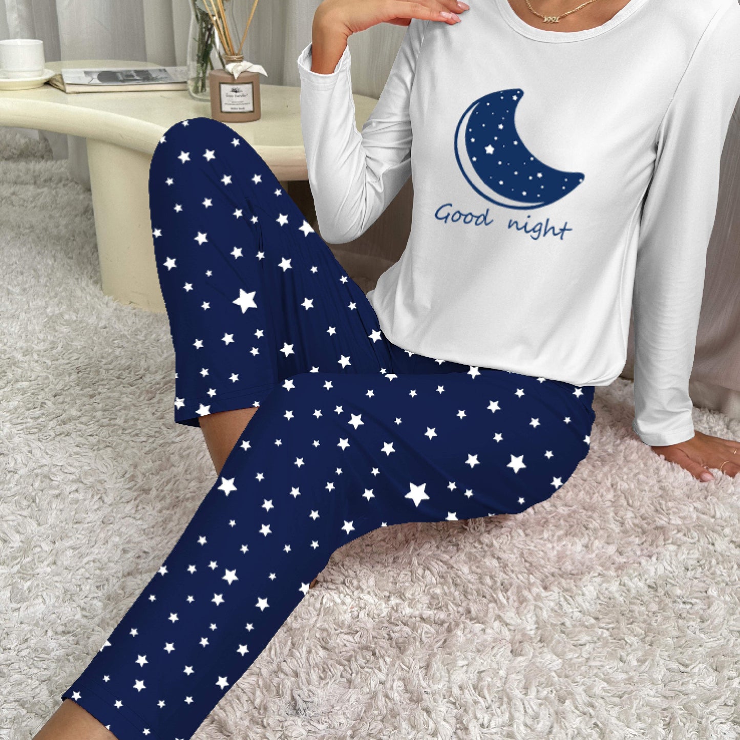 Pijama con estampado de estrellas, manga larga con cuello redondo y pantalones con cintura elástica