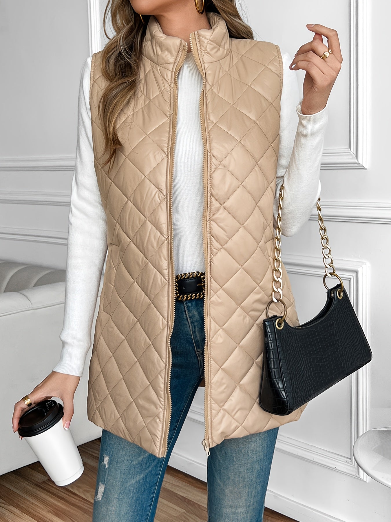 Chaleco acolchado con cremallera y cuello alto